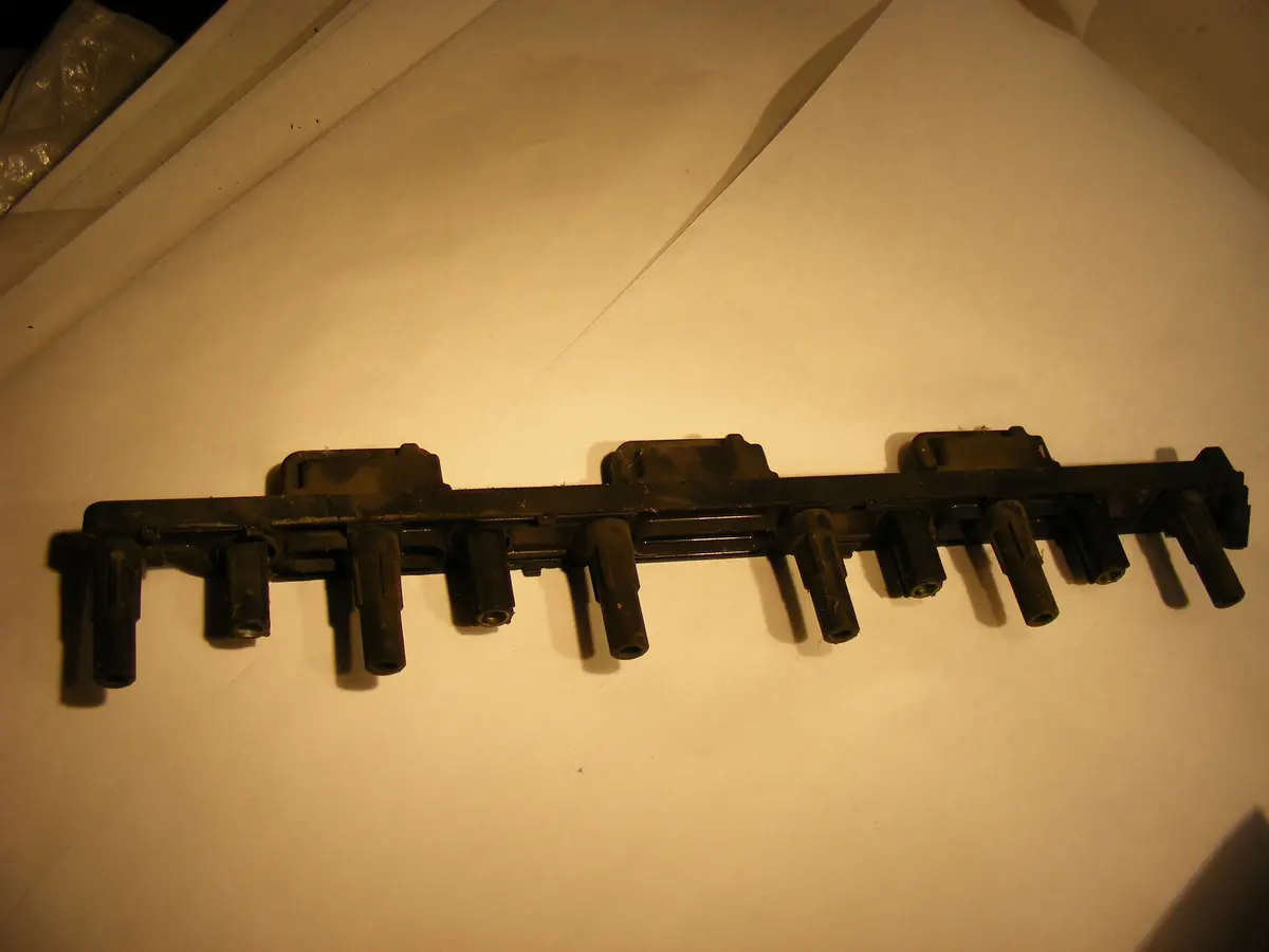 Mopar Original 99 00 01 02 03 04 Jeep Wrangler Cherokee Grand Cherokee Laredo 4.0 L6 Ignition Coil Pack Pick Up Module 1